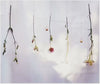 Flowers and Silver and Gold Earrings dropping down